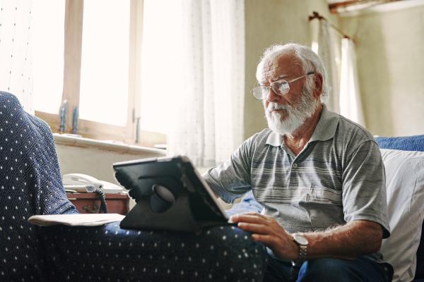 old person with laptop